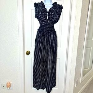 Polka dot ruffled black and white jump suit